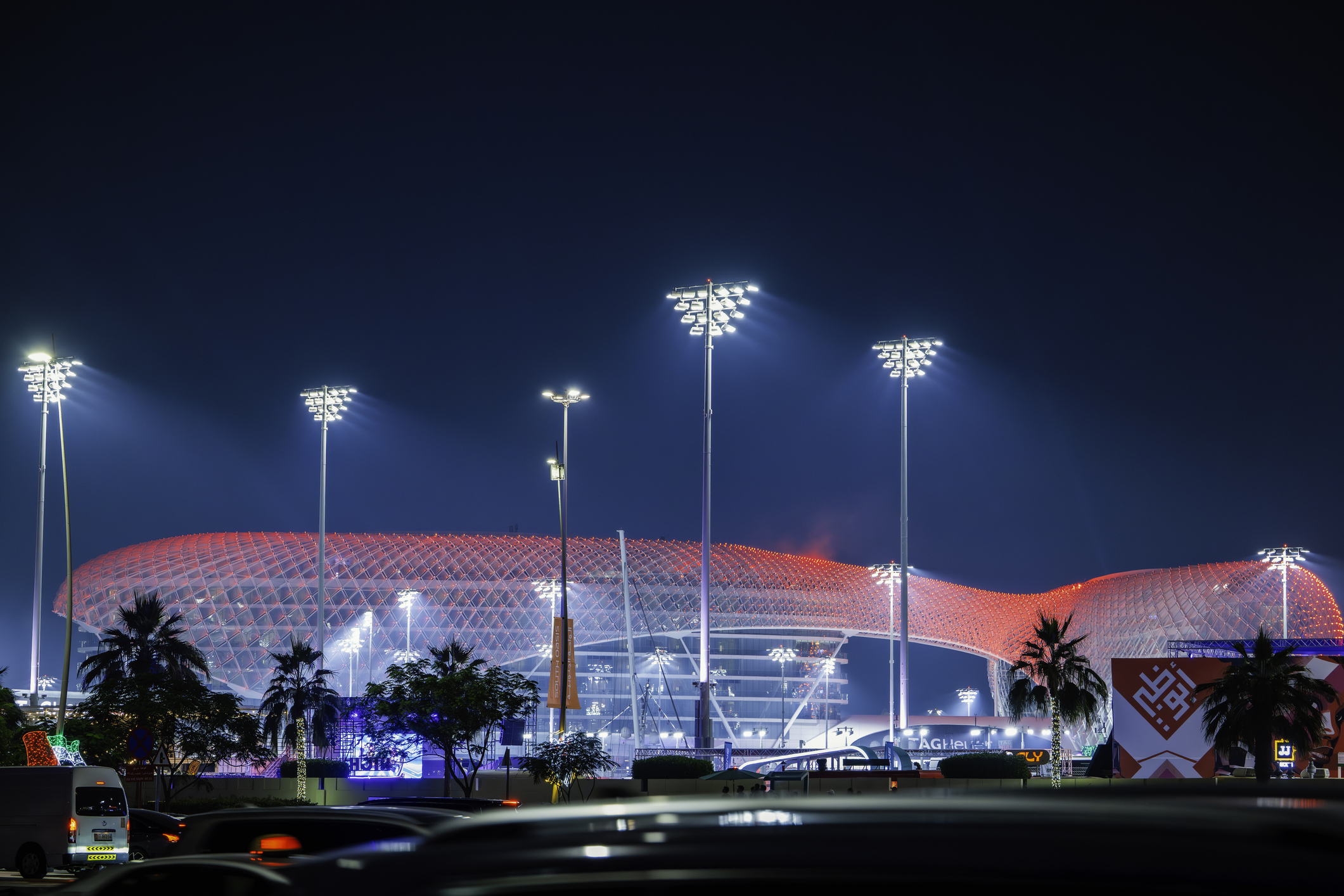 UAE, Abu Dhabi, 07, December, 2025 - Yas Marina Circuit night View with red illuminated architecture in Abu Dhabi. 8K photo.